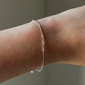 Pulsera cola de ratón y esferas